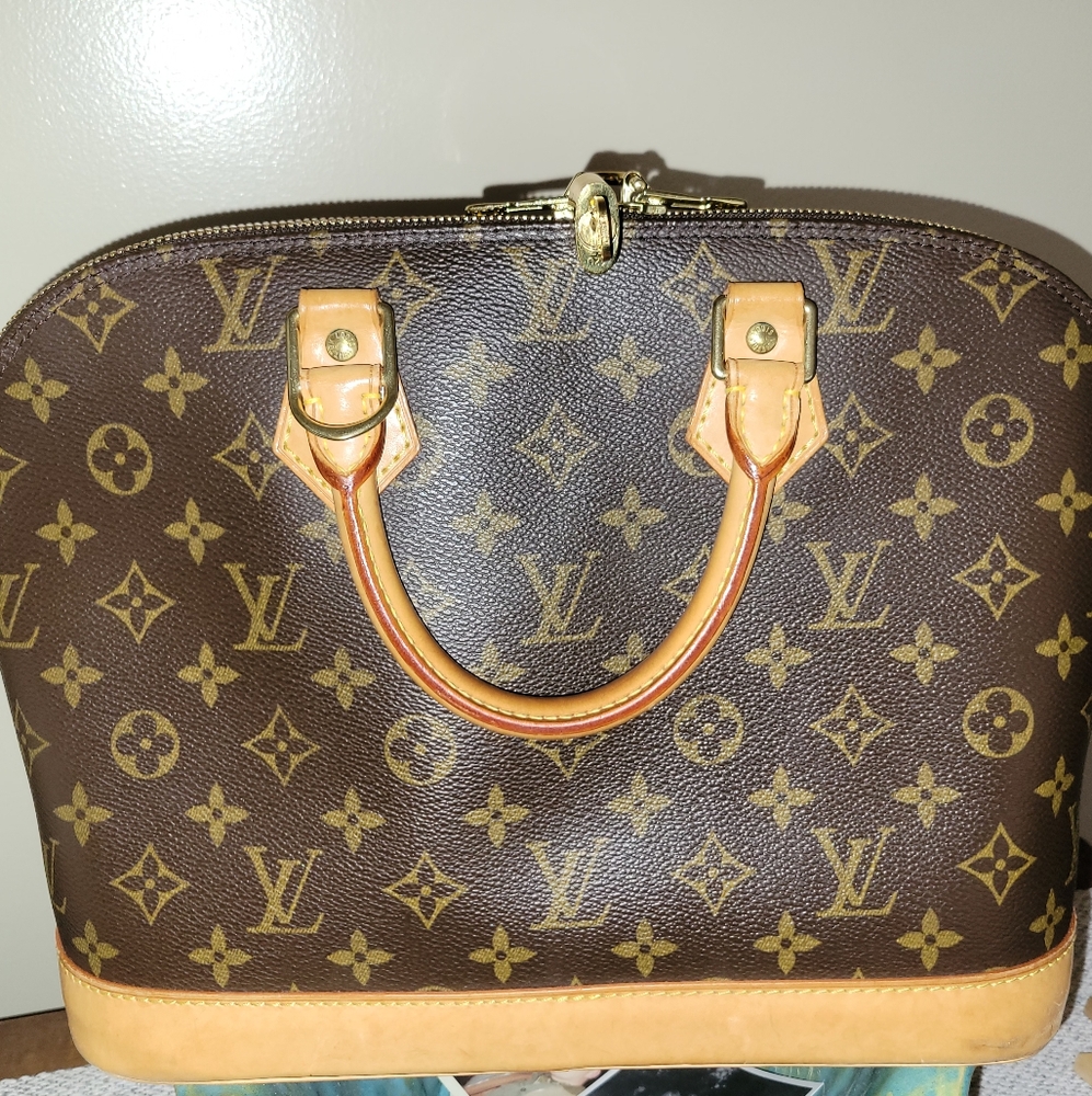 Pre-loved authentic 2004 Louis Vuitton PM Alma
